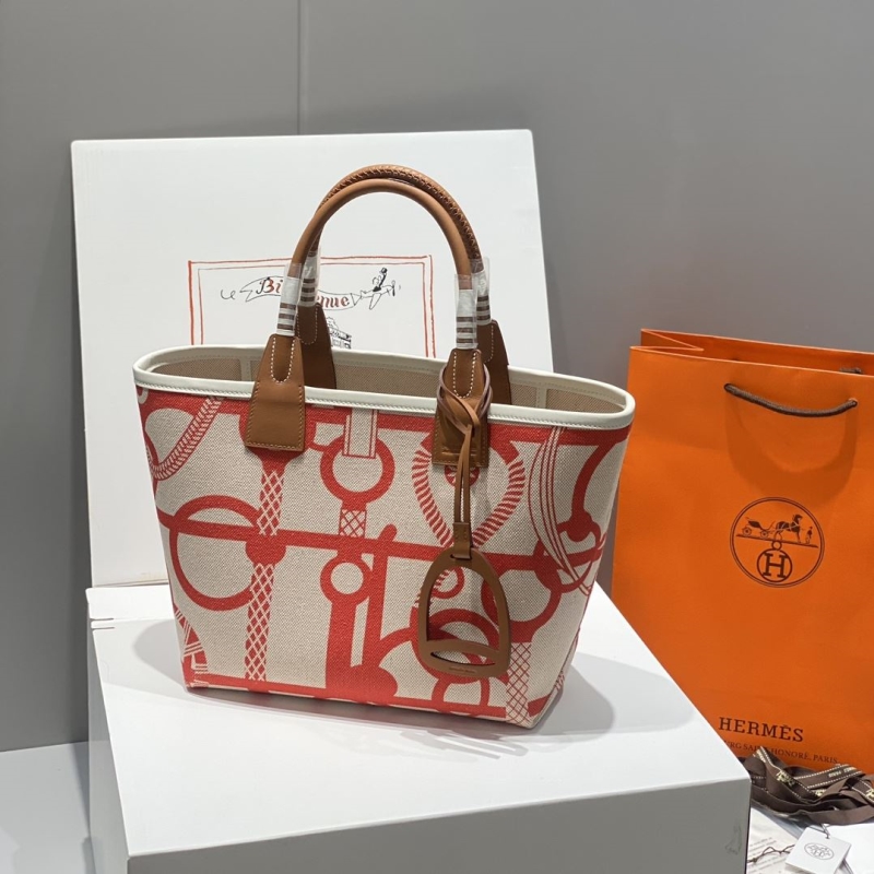 H**mes shopping bags